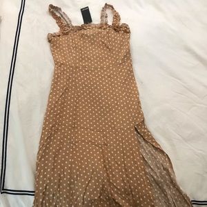 Nasty Gal mustard and white polka dot midi slit